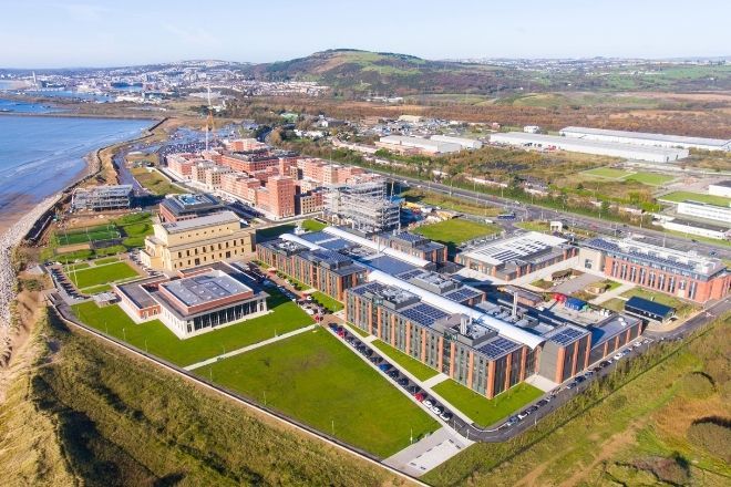 Arial shot of Swansea University beachside campus.